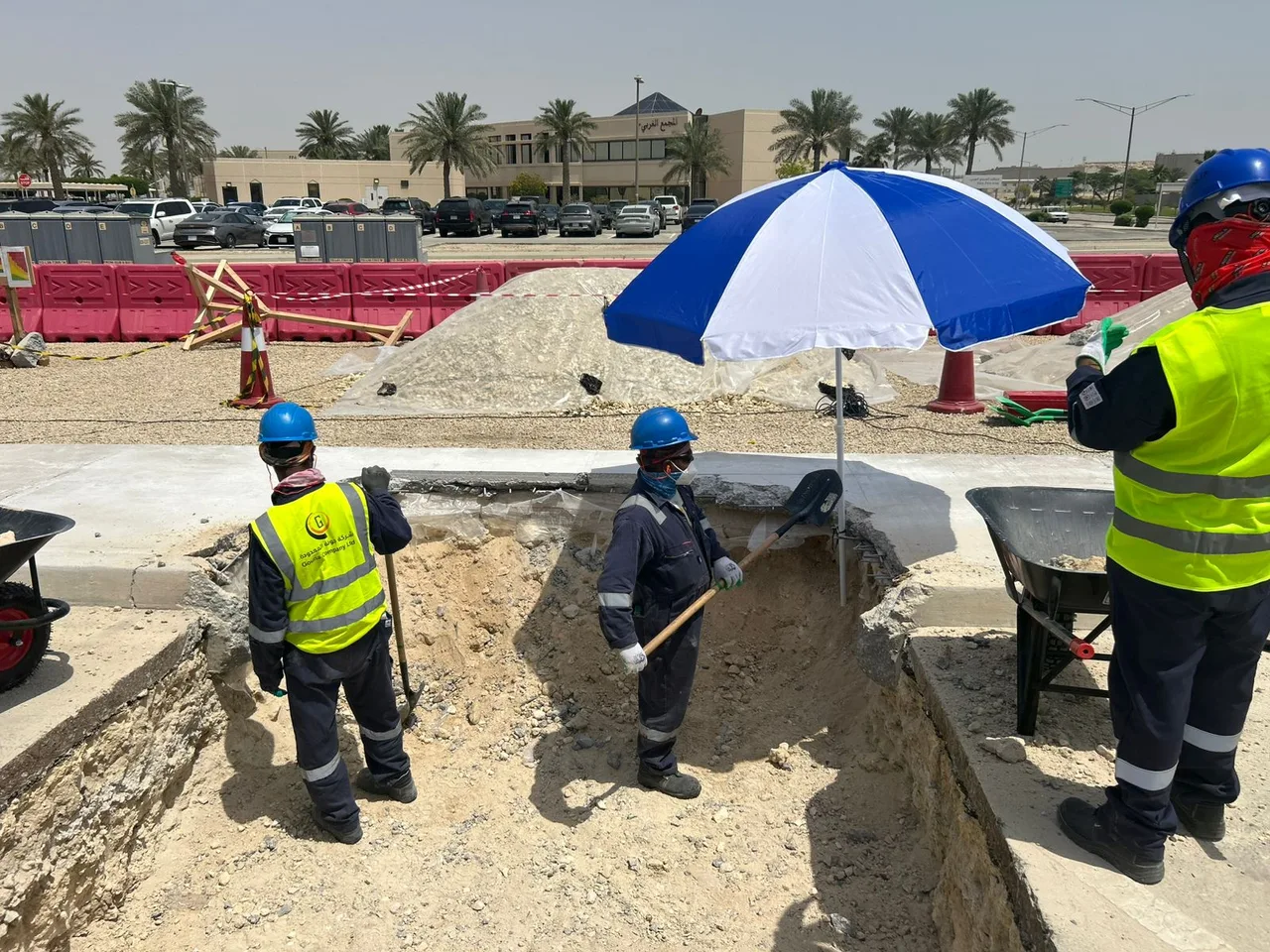 The site team carrying out excavation and ground preparation within a designated work area.
